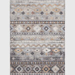 Full view of the Boho Mirage Rug featuring geometric patterns and earthy tones of sandy beige, warm browns, and soft blues.