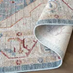 Close-up view of the Ishtar Medallion Rug in Dusty Azure, showcasing its intricate pattern and premium craftsmanship.
