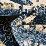 Close-up of Khalifa Imperial Rug showcasing its soft texture, high-quality weave, and luxurious black and beige design.