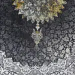 Close-up of Algiers Rug’s intricate Persian medallion design, featuring black, ivory, and gold tones with detailed floral patterns.