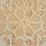 Close-up of the Atlas Bohemian Carpet’s raised texture and plush pile, featuring intricate bohemian-inspired patterns in Desert Sand & Ivory tones.