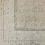 Close-up of the Bukhara Silk Rug, a luxury 480 reeds modern carpet featuring distressed Persian-inspired motifs in warm beige and ivory tones.