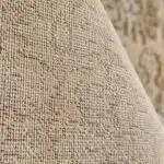A close-up view of the Celeste Rug’s durable jute and cotton backing, ensuring long-lasting strength and stability.
