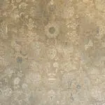 Close-up view of Damascus Heritage Rug, showcasing its intricate floral medallion, arabesque detailing, and distressed vintage aesthetic, woven with 1200 reeds and 3600 density for luxury interiors and high-end wholesale buyers.