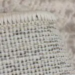 Close-up view of the Doha Carpet’s tightly woven backing and reinforced edge finishing, ensuring durability and long-lasting quality.