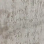 Close-up view of the Doha Carpet’s ultra-soft surface, showcasing its elegant high-low texture in warm ivory and taupe tones.