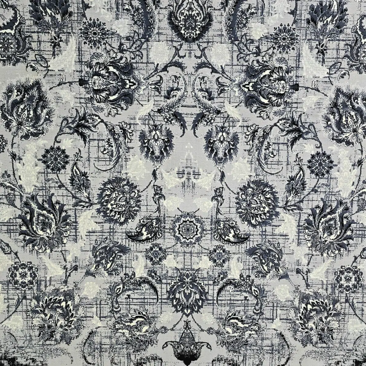 A close-up of the fine floral patterns on the Dubai Carpet, intricately woven for a timeless look.