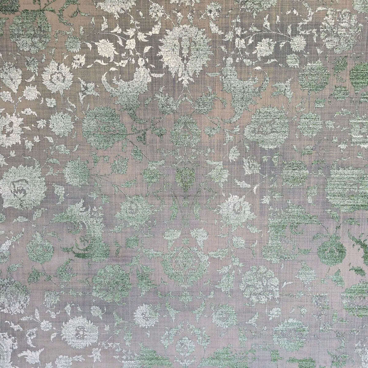 Emerald Carpet – Close Up of Vintage Floral Weaving with Distressed Green Accents