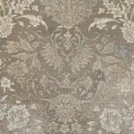 Close-up view of the Emir Carpet showcasing its intricate floral motifs and ornate patterns in a vintage distressed aesthetic.