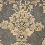 A detailed close-up of the Malik Carpet, showcasing its intricate Persian floral motifs in beige, navy blue, and pastel accents, woven with 1200 reeds for a refined finish.