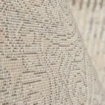 Backing view of the Monarch Deco Carpet, showcasing its durable jute-cotton structure and high-quality weaving for luxury interiors.