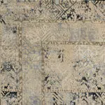 Close-up of the Nomad Haven Rug showcasing intricate geometric patterns in warm desert hues, ideal for contemporary and rustic interiors.