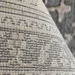 A close-up of the Riyadh Carpet’s tightly woven backing, highlighting its durable jute-cotton blend for stability and longevity.
