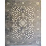 Royal Bloom Carpet in a deep blue-gray palette, featuring intricate floral motifs and 1200 reeds weaving, perfect for elegant and luxurious interior spaces.