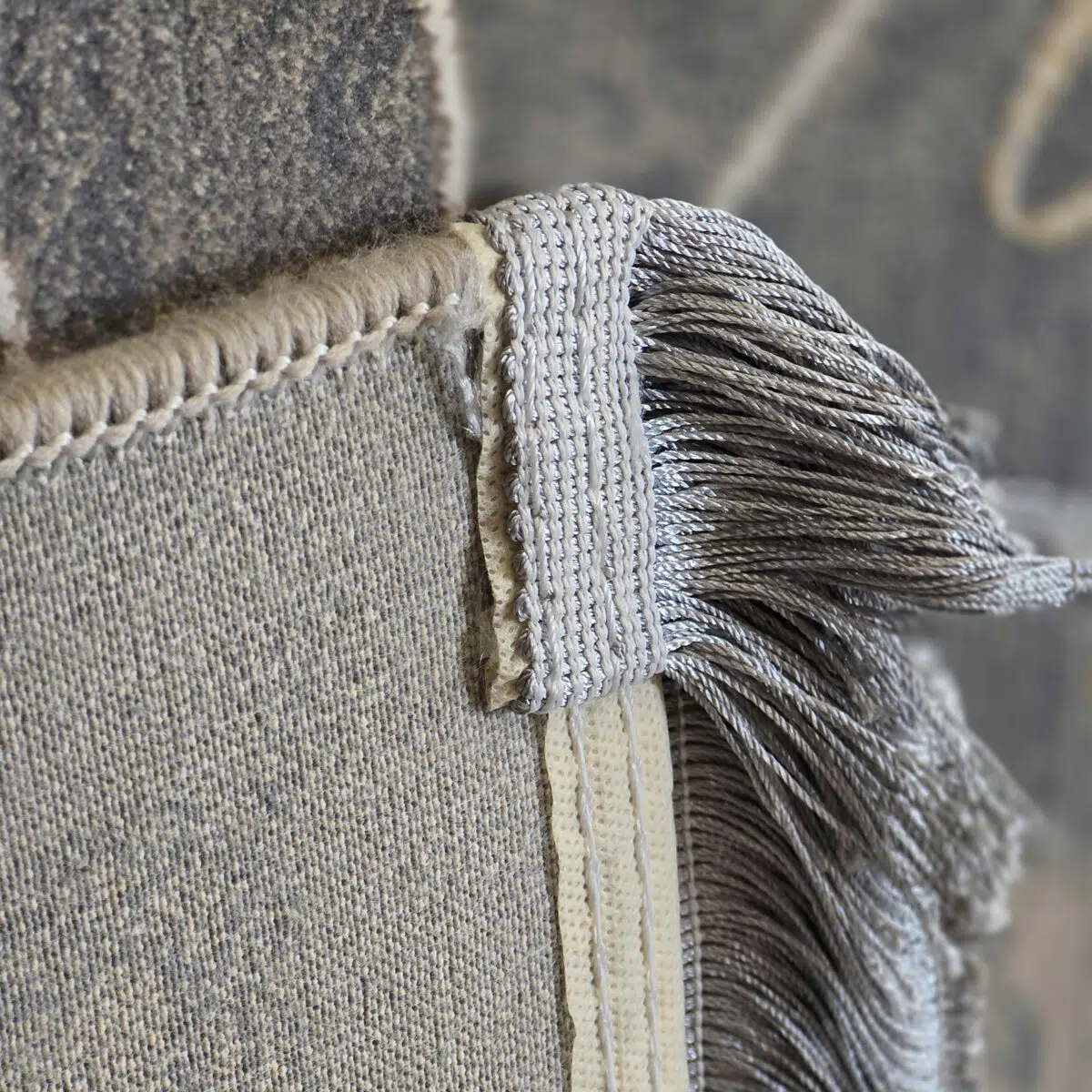 A close-up view of the Royal Bloom Carpet’s finely woven fringe, displaying meticulous craftsmanship and durable finishing.