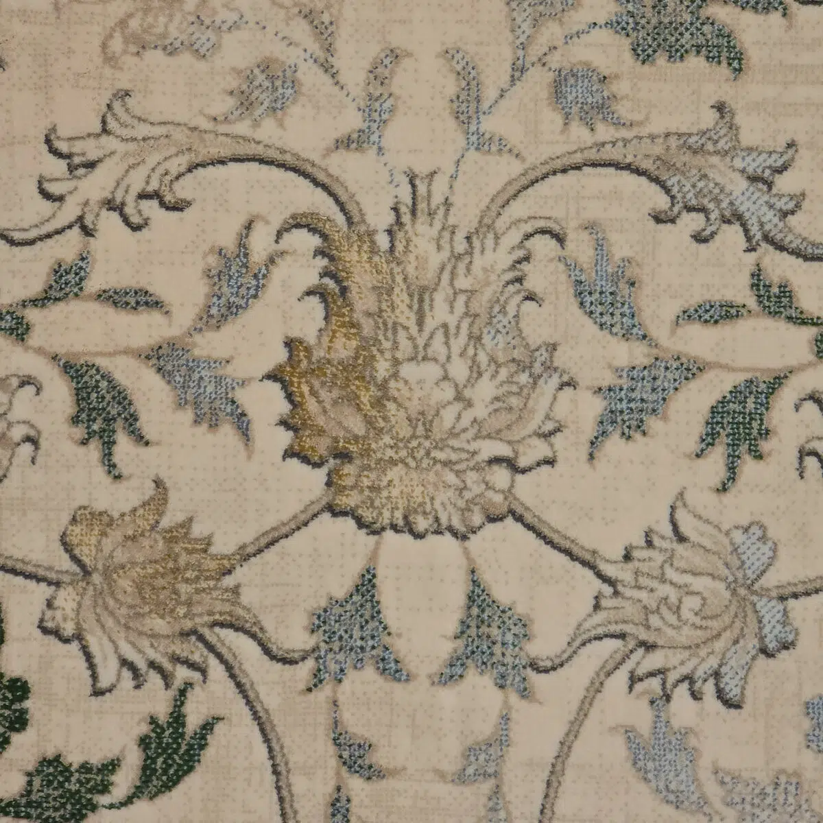 Close-up of Seraphic Carpet showcasing intricate floral patterns in gold, blue, and green on a soft beige background.