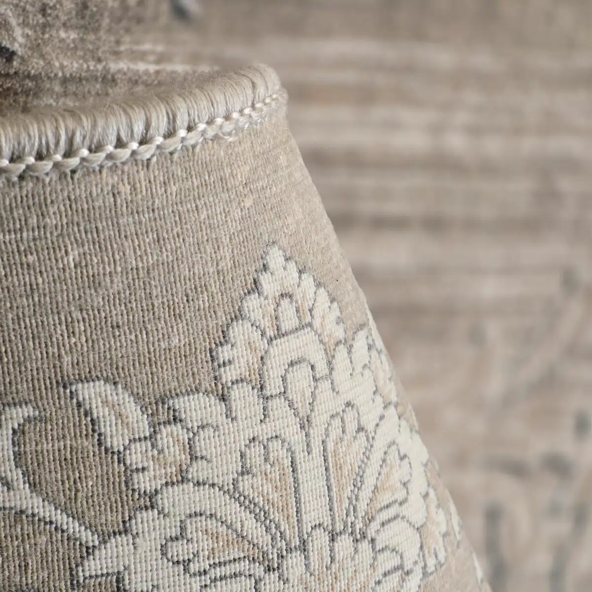 Close-up of Sultan Carpet’s tightly woven backing with precision-stitched edges, ensuring longevity and durability.