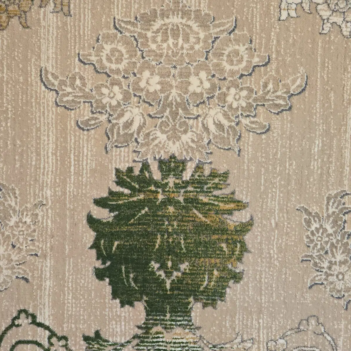 Close-up of the Sultan Carpet’s raised floral pattern in green, gold, and ivory on a soft beige background.