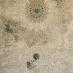 Close-up of Sultan Carpet’s intricate medallion featuring floral and geometric patterns in beige, gold, and green tones. • 📖 Description: A detailed view of the Sul