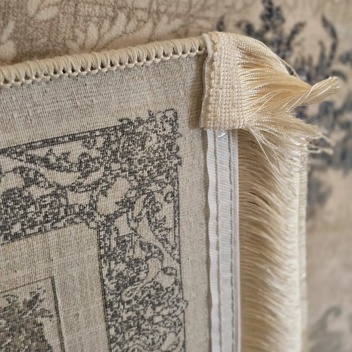 Close-up of the Sultan Qaboos Rug’s tightly woven backing with precision-stitched edges and luxurious fringe for durability and elegance.