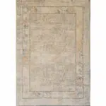 Abstract geometric beige rug with a distressed texture and subtle linear patterns, designed for minimalist and modern interiors.