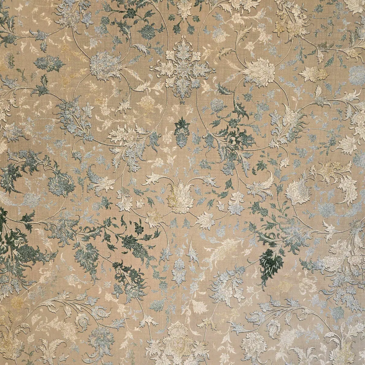 Close-up view of the Zamzam Carpet’s detailed floral patterns, featuring delicate beige, green, and soft blue accents in an elegant woven texture.