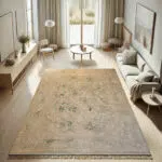 The Zamzam Carpet, a premium floral medallion rug with intricate beige and green detailing, placed in a modern, minimalist living space.