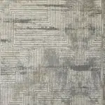 Detailed view of the Andalus Modern Rug, showcasing its geometric abstract pattern in neutral tones of grey, beige, and ivory.