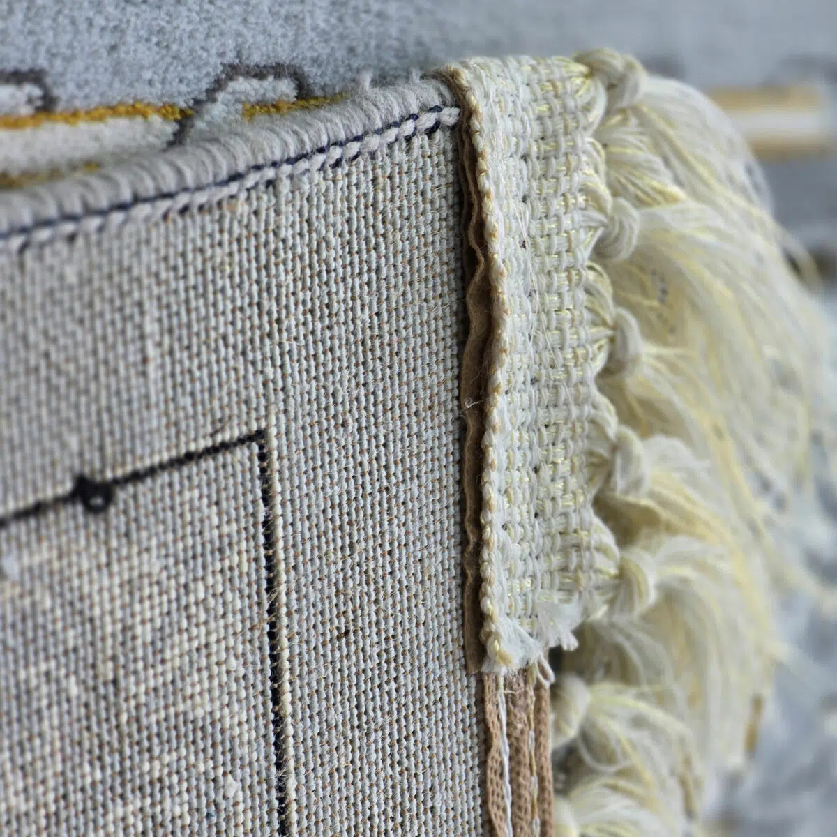A detailed view of the high-quality weave and fringes of the Muscat Carpet, showcasing premium craftsmanship.