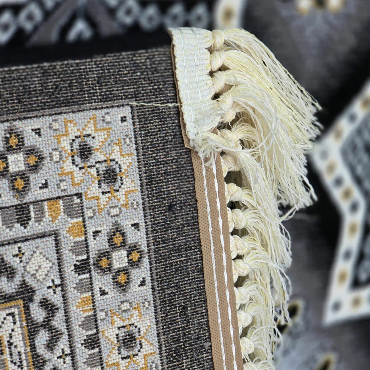 Close-up of the Kuwait Royal Carpet fringe and border, showcasing fine craftsmanship and intricate details.