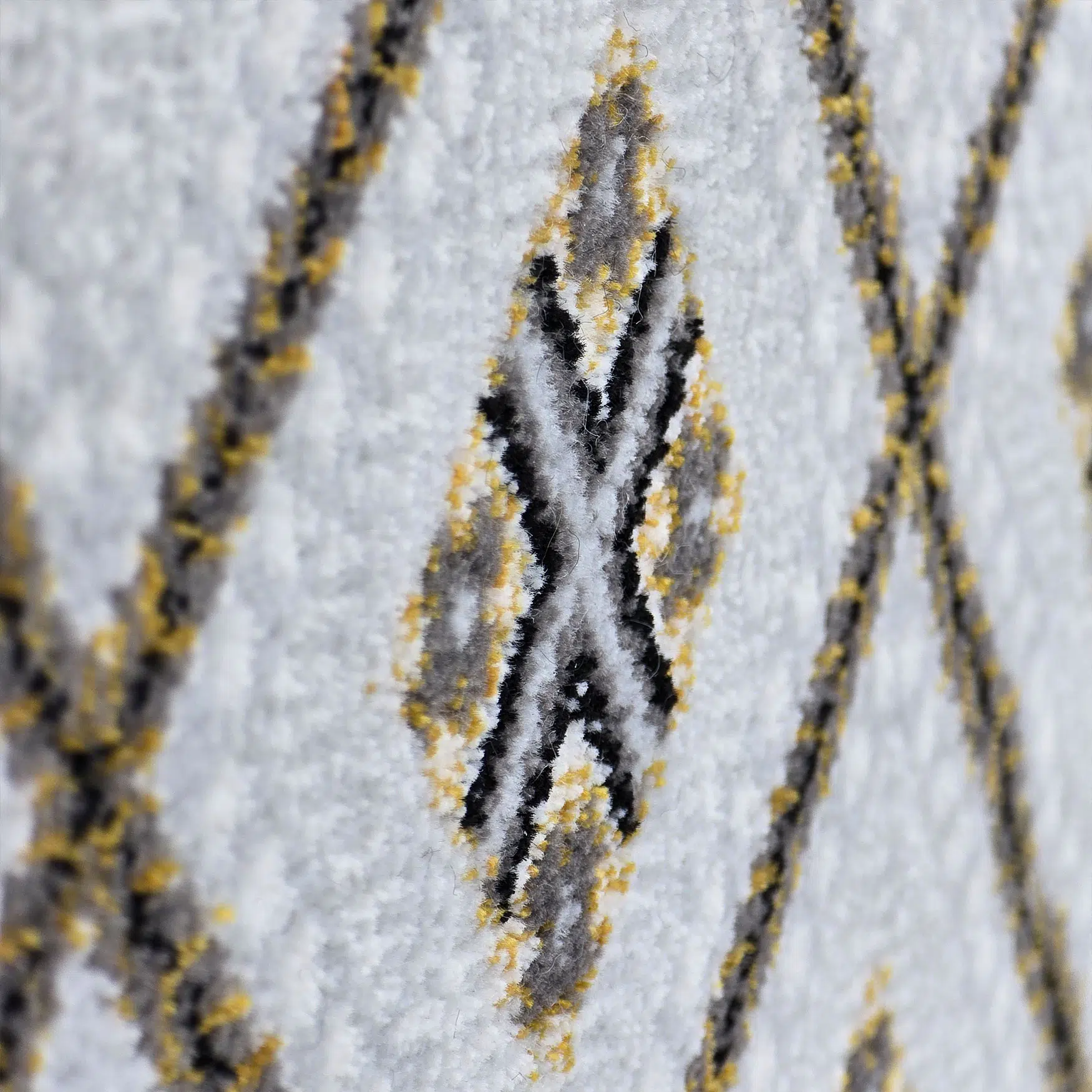A close-up of the plush texture and finely detailed patterns of the Manama Harmony Carpet.