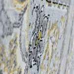 A macro shot of the Muscat Carpet’s texture, revealing its fine pile and luxurious fabric quality.