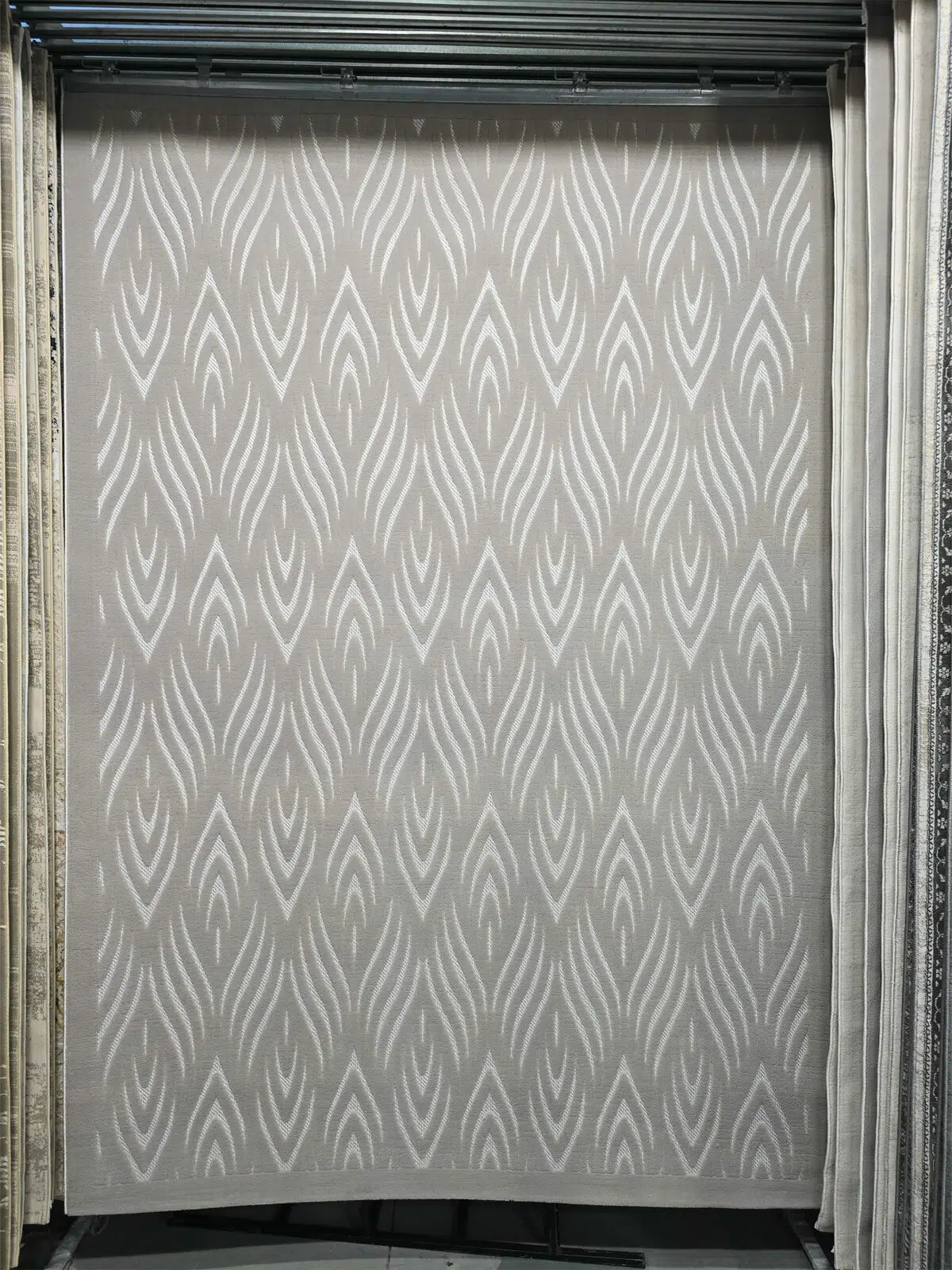 Full view of Atlas rug with flame-shaped minimalist pattern
