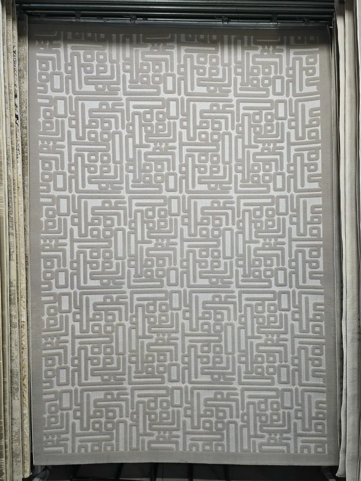 Full view of Aurora rug with elegant feather-like geometry