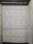 Full view of Eclipse rug with tribal-inspired geometric patterns