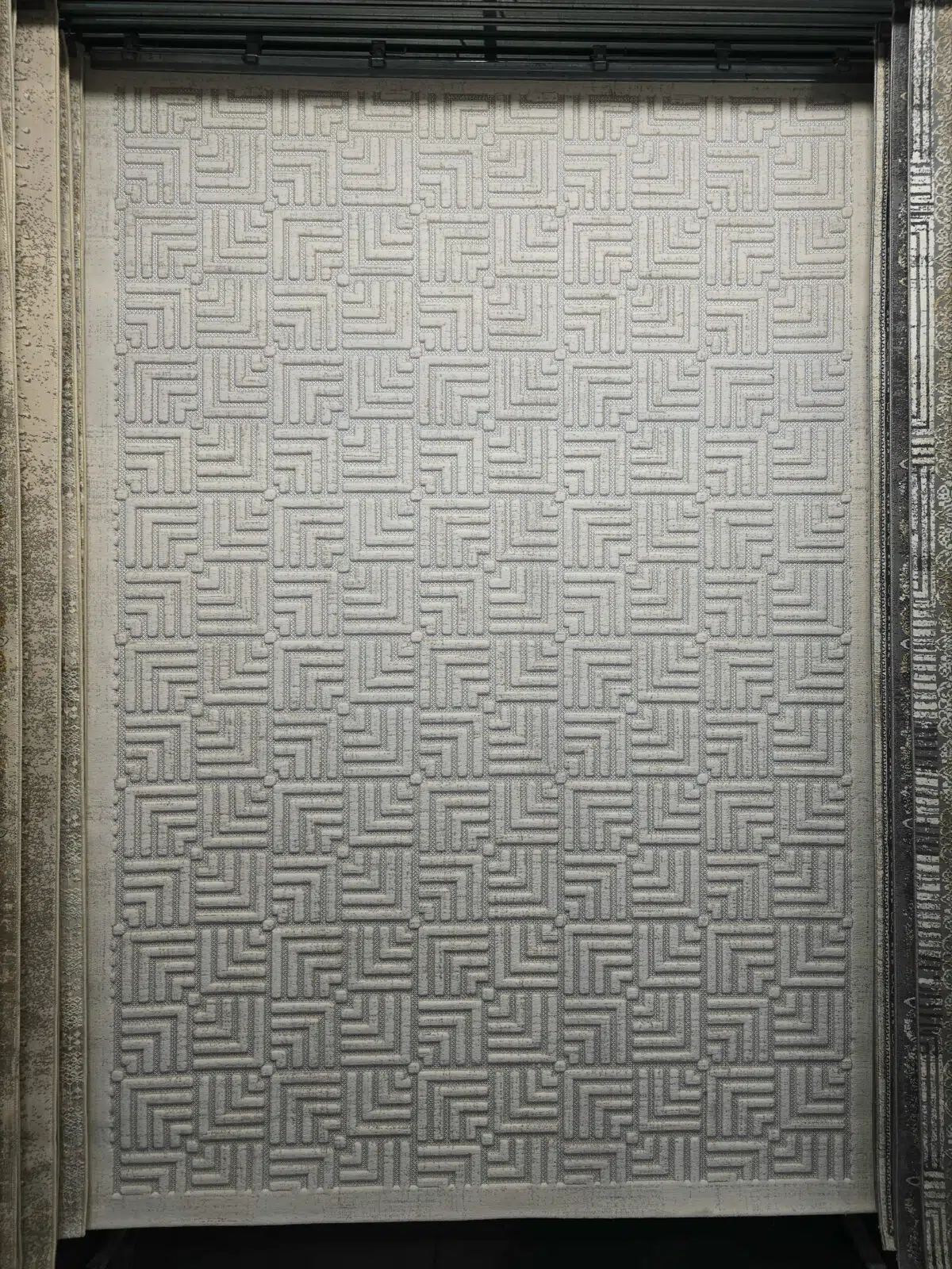 Full view of Lyra modern carpet with light-toned geometric pattern