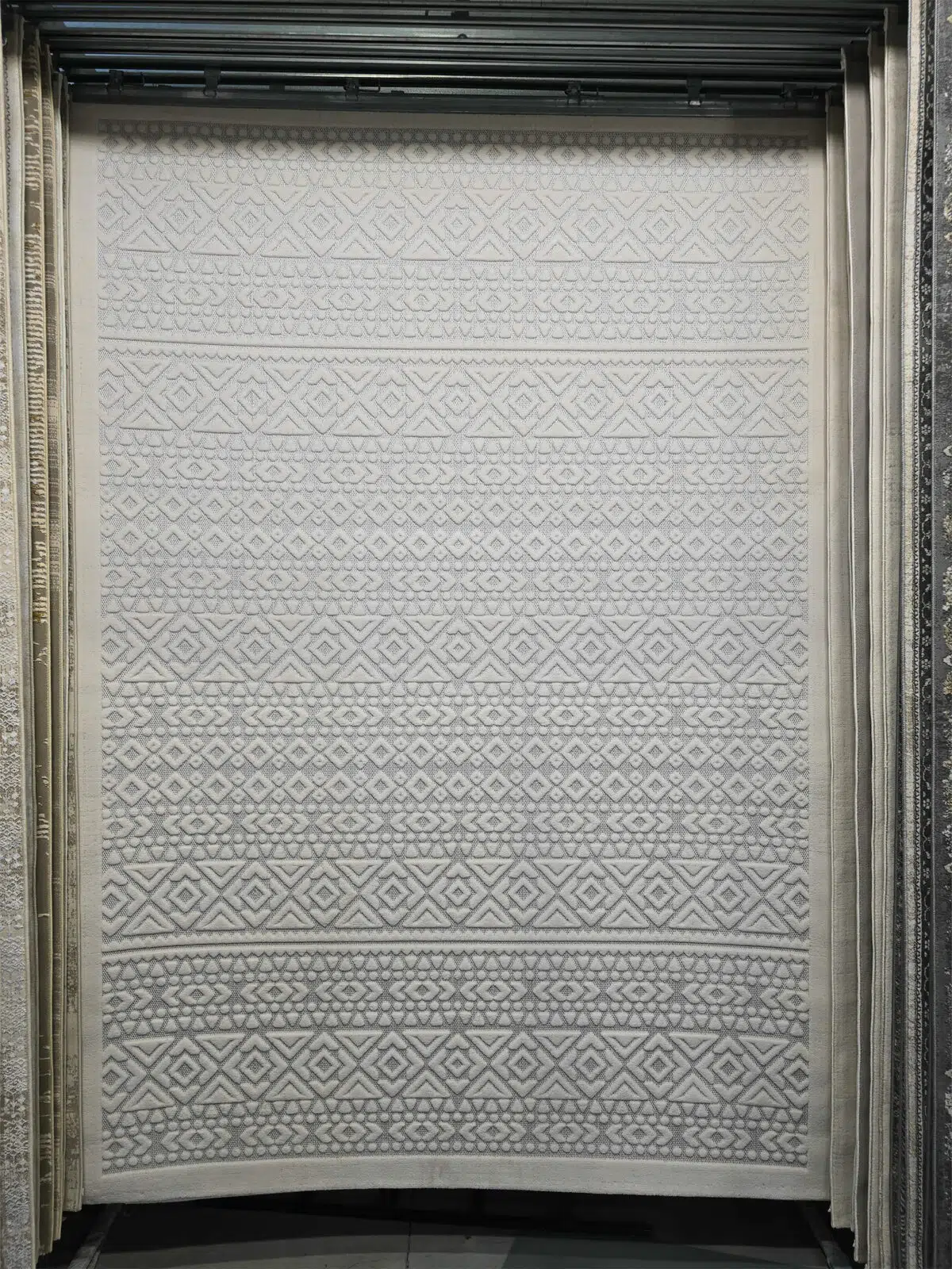 Minimalist white Nova rug with symmetrical geometric texture, full front view