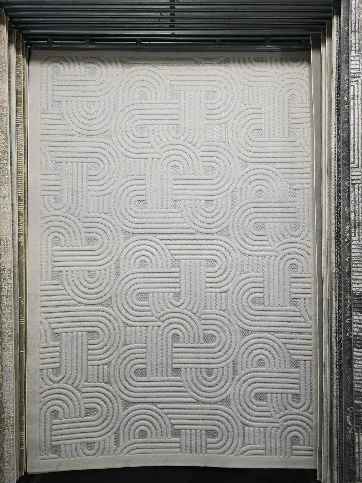 Full view of Sirius rug with modern curved line pattern