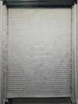 close-up of Solaris Rug with diagonal geometric texture in soft beige tones