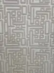 Close-up of Aurora rug’s soft feather-shaped design