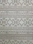 Close-up of Eclipse rug showing its structured tribal design
