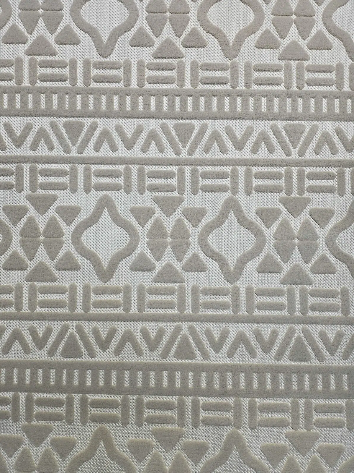 Close-up of Eclipse rug showing its structured tribal design
