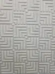 Zoomed-in section of Lyra rug pattern with angular cornered layout