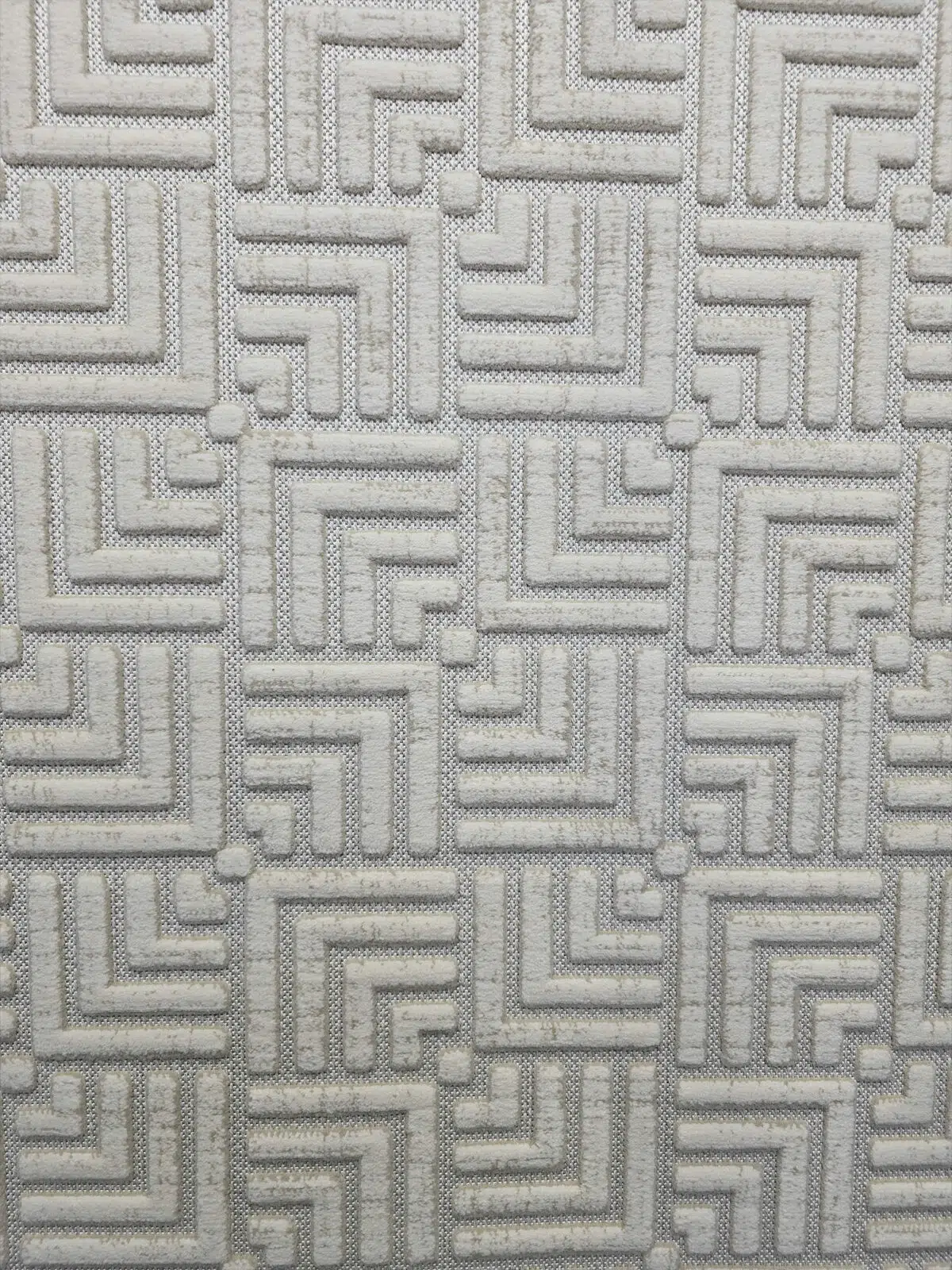 Zoomed-in section of Lyra rug pattern with angular cornered layout