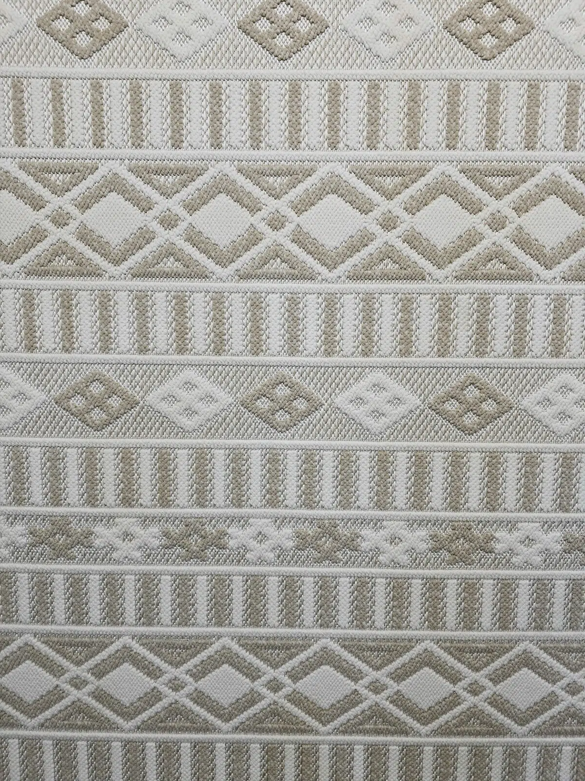 Middle section of Radiant rug showcasing repeated diamond and line patterns
