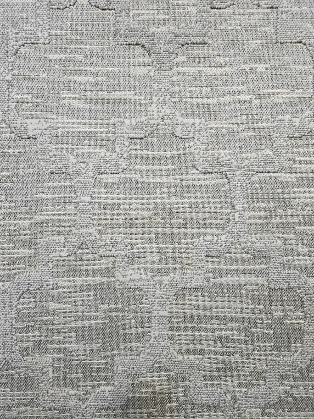 Zoomed view of Twilight Rug highlighting raised lattice geometry and linear texture