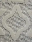 Zoomed-in center design of Apollo Rug with diamond-shaped pattern
