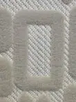 Macro detail of Aurora rug showing raised acrylic weave