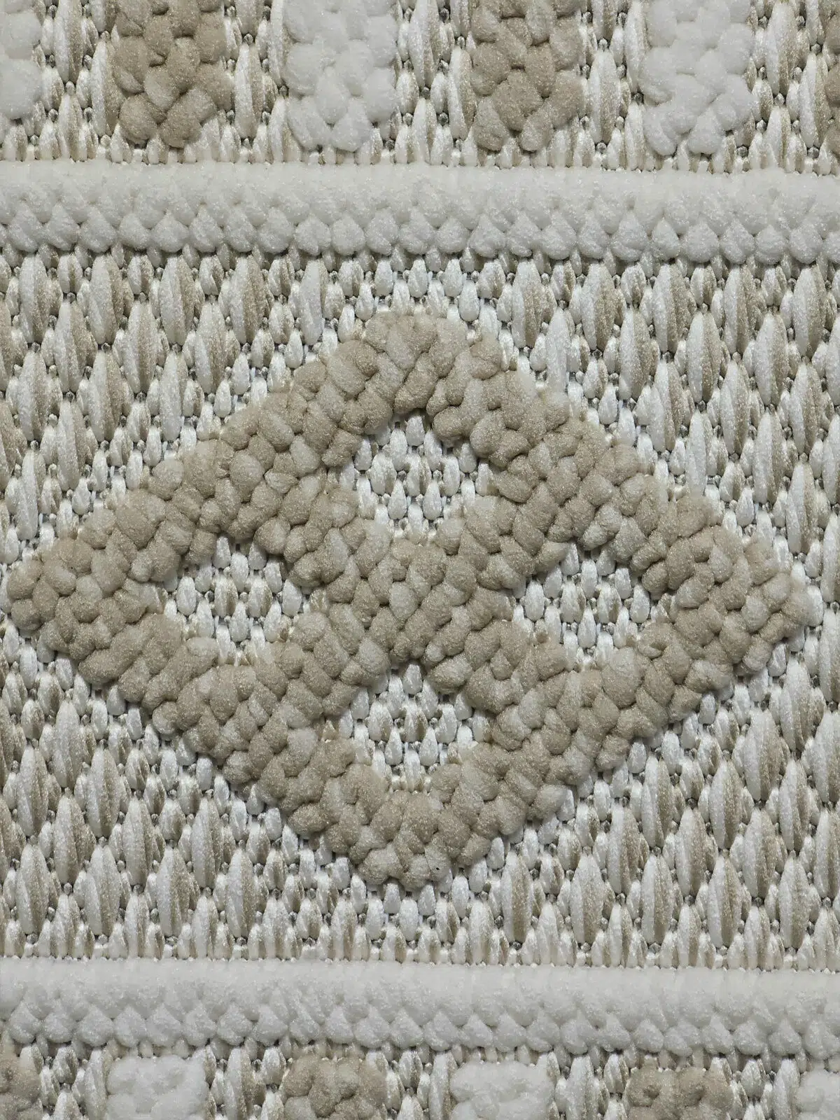 Macro shot of soft raised diamond shape on the Radiant carpet