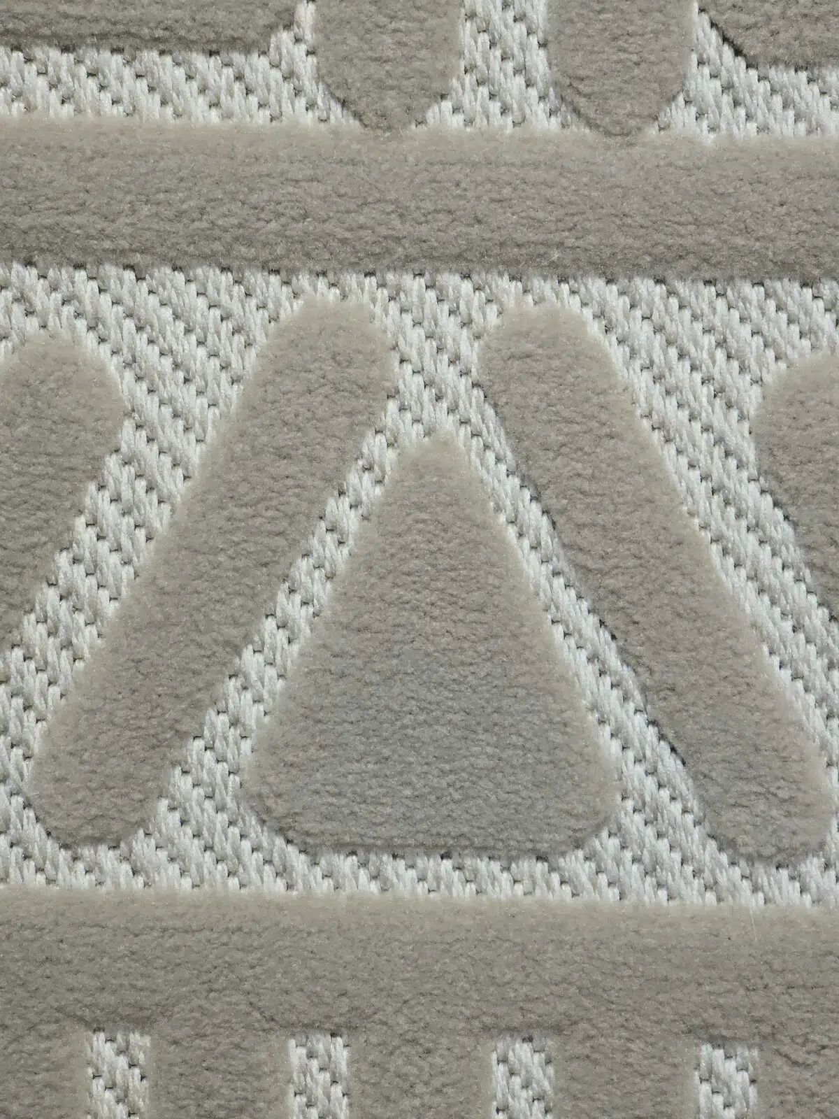 Macro zoom of Eclipse rug showing textured triangle motifs